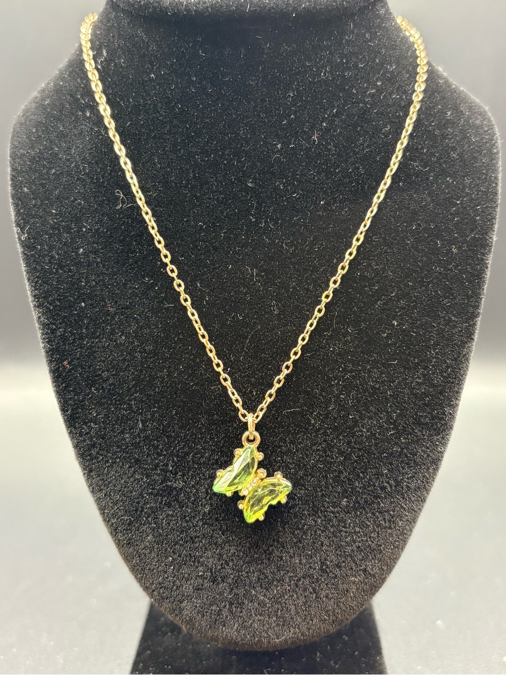 Claire's Gold  tone Necklace with Lime Green Butterfly Charm